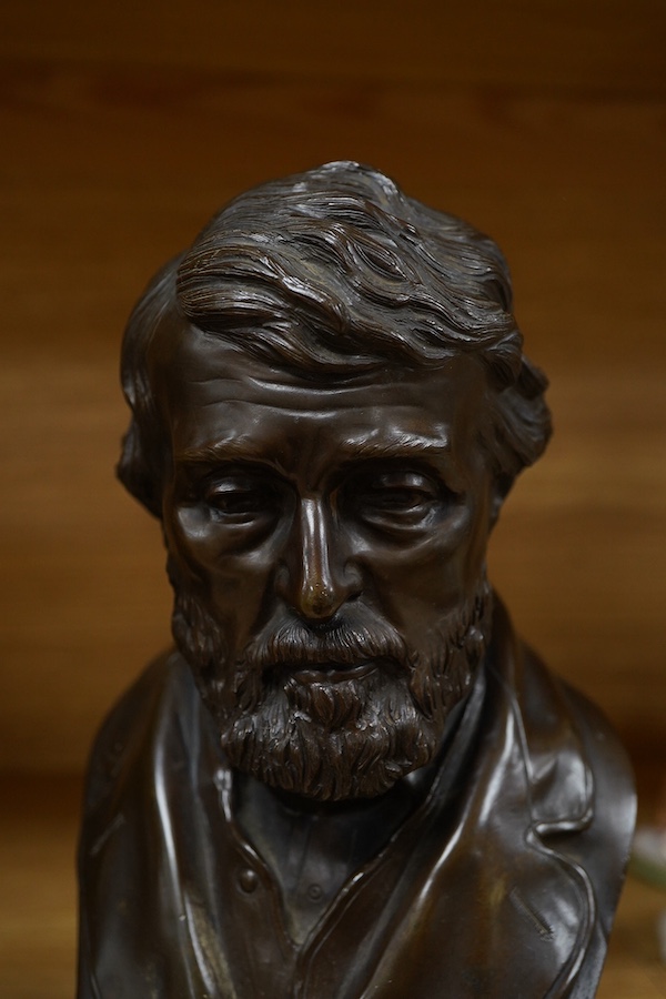Two bronze busts of Oliver Cromwell, indistinctly signed and Thomas Carlyle, largest 26cm high